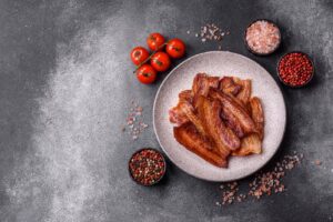 ¿Por qué amamos el tocino? Detrás de uno de los sabores más irresistibles del delivery